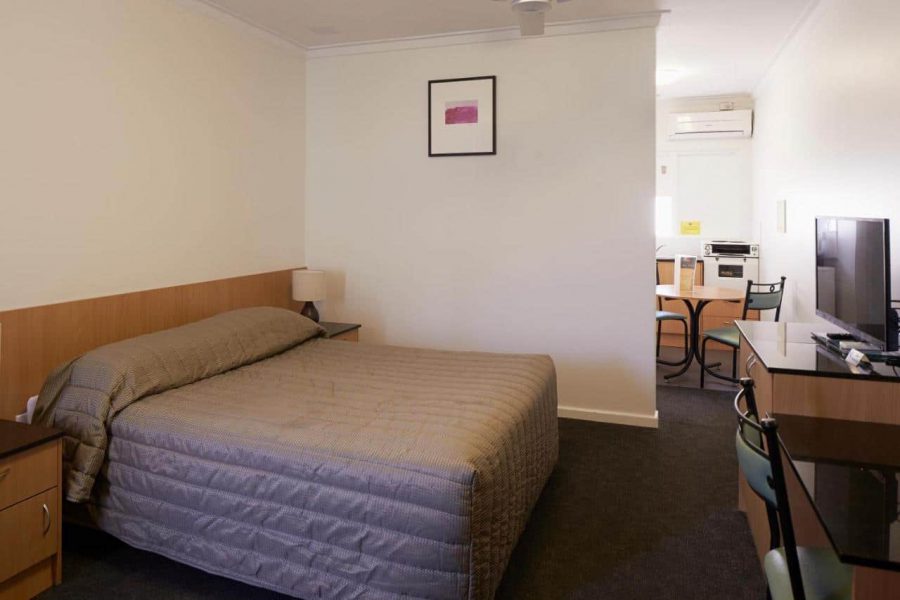 MediStays hotel room with a large comfy bed for country patients staying near the hospital.