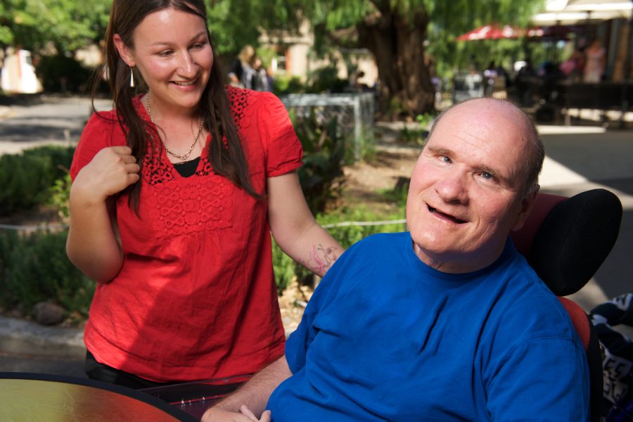 Man with a disability and his NDIS support worker